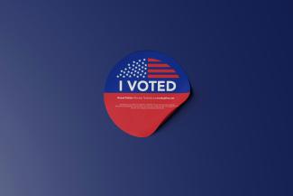 a red, white and blue sticker that says i vote by Mockup Free courtesy of Unsplash.